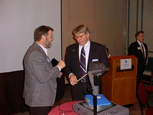 Applied Materials executive Mark Nelsen talking with Garter Group's Ray Bender